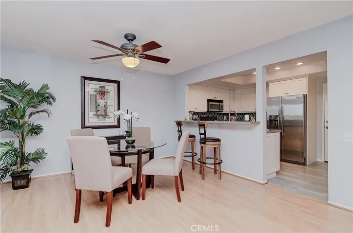 The cook is part of the action with this open kitchen concept...breakfast bar is perfect for watching the action...or a nice place to do homework.