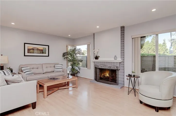 Great room concept in this open, contemporary floor plan let's your enjoy the fireplace and patio views from every angle.