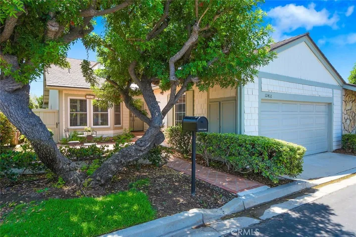 Welcome home to The Colony in North Tustin, where neighbors become friends and mature trees line the quiet streets.
