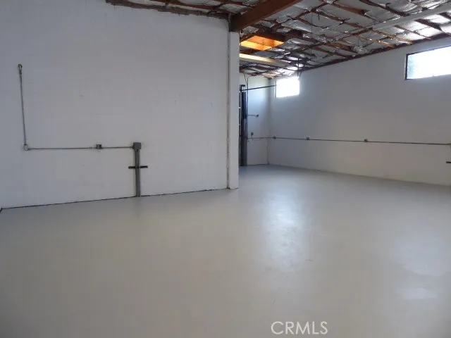 Spacious area with electrical conduit in multiple areas