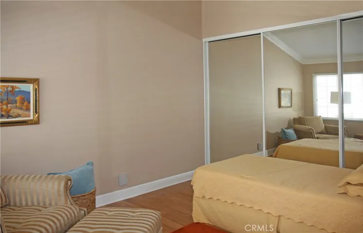 Second Bedroom, Could be an Office, With Lots of Storage Behind Triple-Mirrored Closet Doors.
