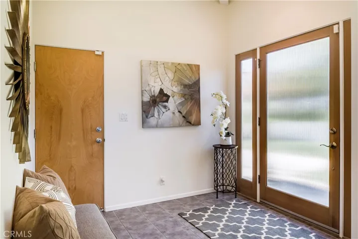 Large foyer with direct access to the 2 car garage.