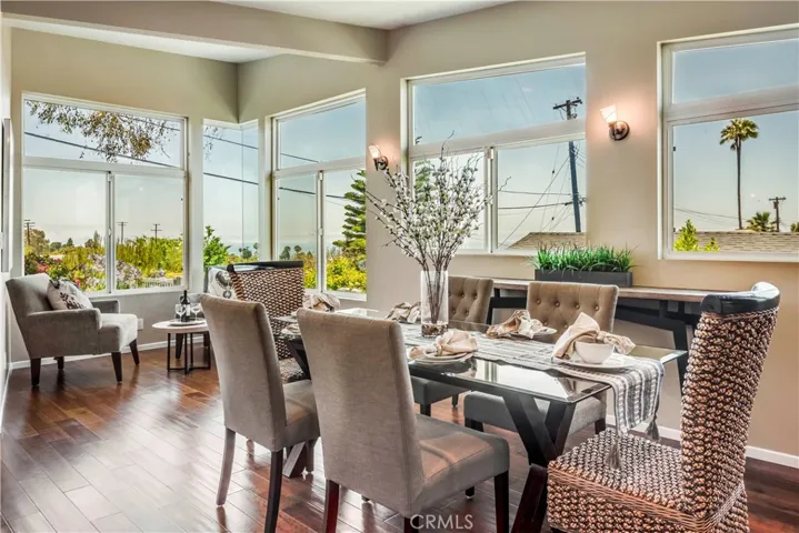 Dining room and sitting area take advantage of the ocean and Catalina views