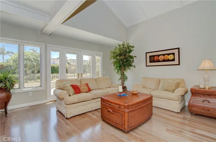 Vaulted ceiling and wood accents add nice volume and details to the space.