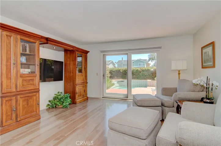 Awesome, separate family room could be perfect for home theater, game tables...and that 80" flat screen...