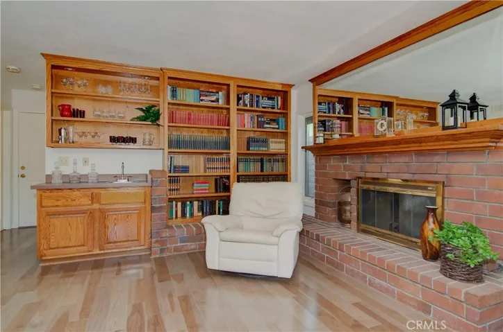 Wow...look at this corner of the family room...has everything you could want for an evening "cozy up"...cocktails, a good book, lounge chair...and warm fire.  Does it get any better than this?...no!