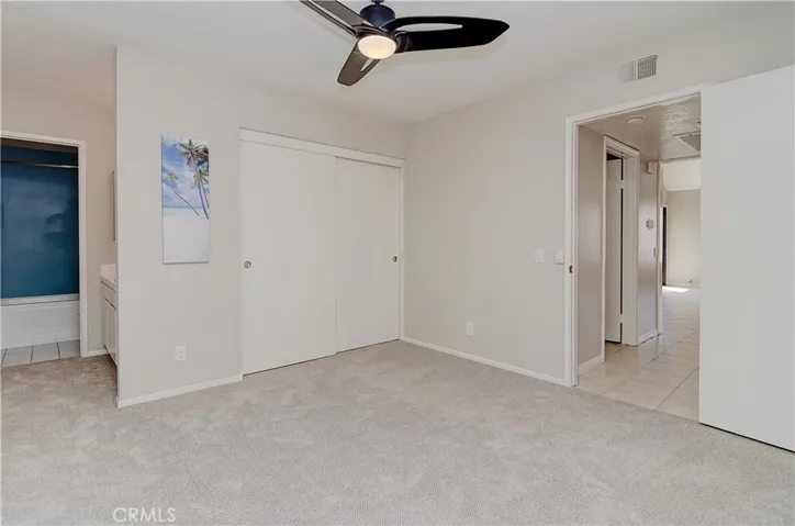 Second master has large wardrobe closet and bath with separate vanity area.