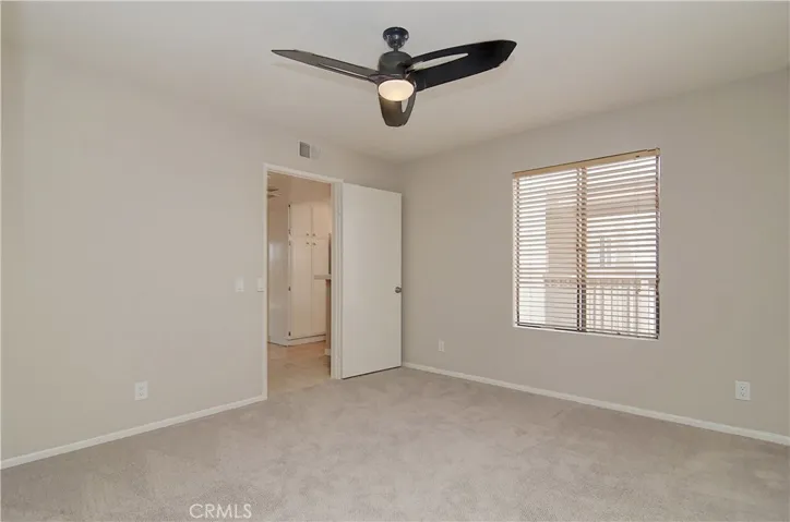 Contemprary ceiling fan keeps you cool all the time...this is a nice private getaway for guests or roommate.