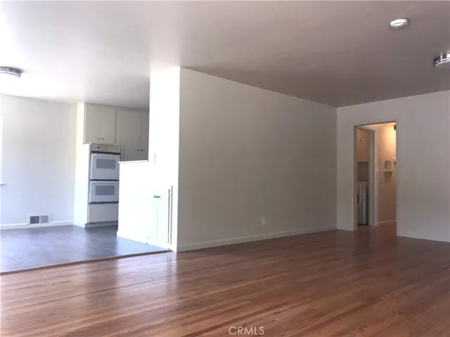 Living room to dining room and kitchen