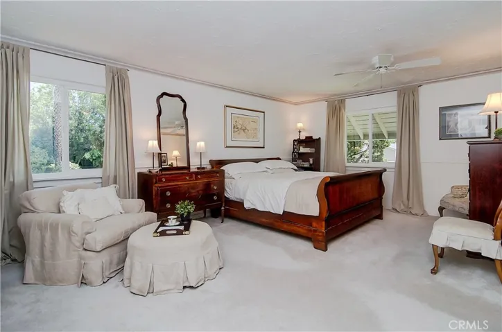 King size master suite has plenty of space for any scale of furnishings.