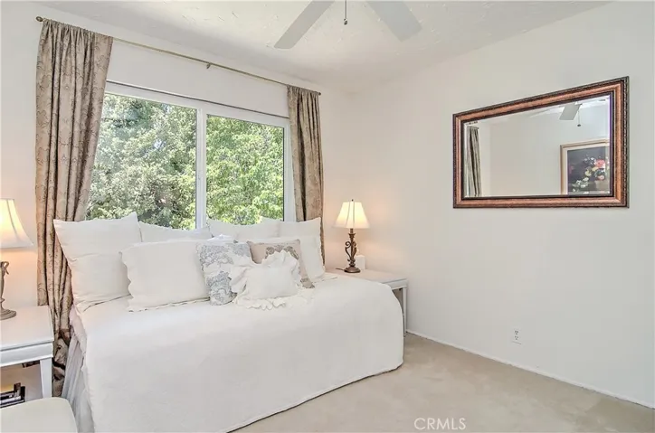 Large windows create bright, cheerful spaces throughout this wonderful home.