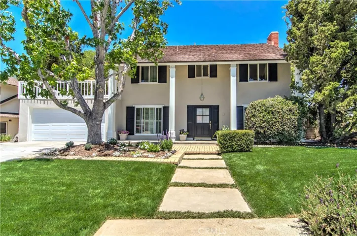 Stately curb appeal, plus columned front porch say you've arrived!