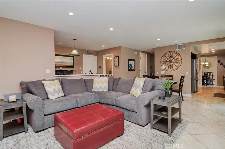 Fantastic floor plan is perfect for family or entertaining...the party can flow from room to room....outside too!