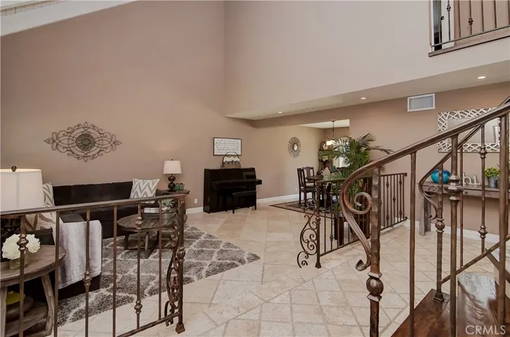 Wow is right...so much rom! You'll enjoy all the spaces and places...love those travertine floors!