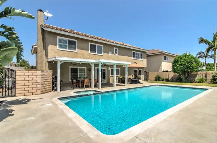 Your place will be the place to be!  Completely updated pool and spa...grassy lawn for games and pets...and that awesome party patio...