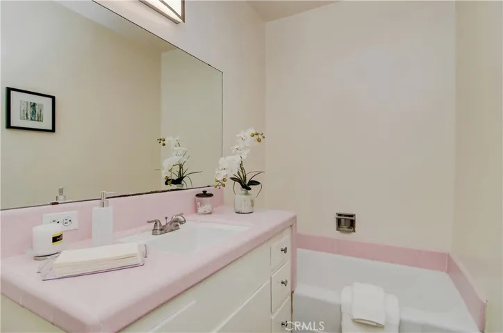 Period details add a Nostalgic vibe in the hall bath.. Feel like a soak? The Cast Iron Tub holds in the heat way better than today's flimsy fiberglass ones!