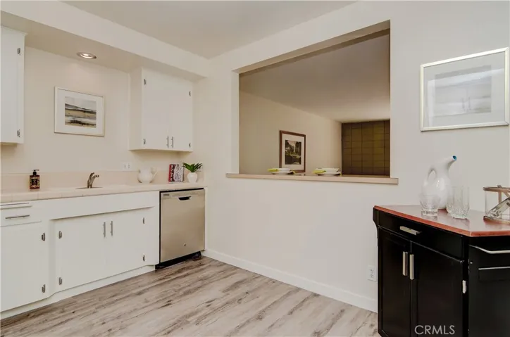 Plenty of room for a kitchen table here! Note the new Dishwasher too!