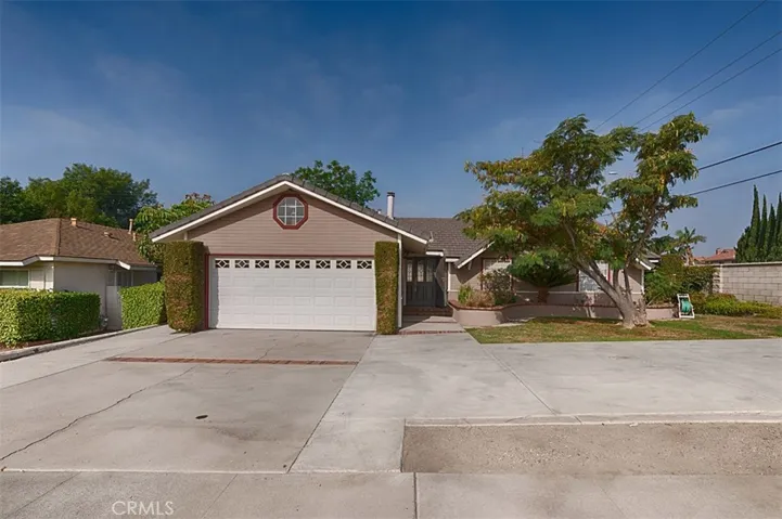 Opportunity knocks!  One story with three bedrooms, two baths, tile roof, and plenty of parking in the front and behind the gate in the back yard.  Be sure to see all of the pictures.