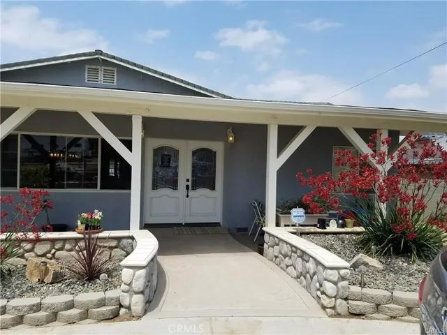 GORGEOUS BEVELED GLASS FRONT DOORS WITH COVERED FRONT PORCH