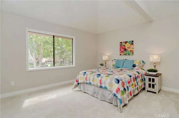 MASTER BEDROOM: Wake up every morning with views of the water and landscape.
