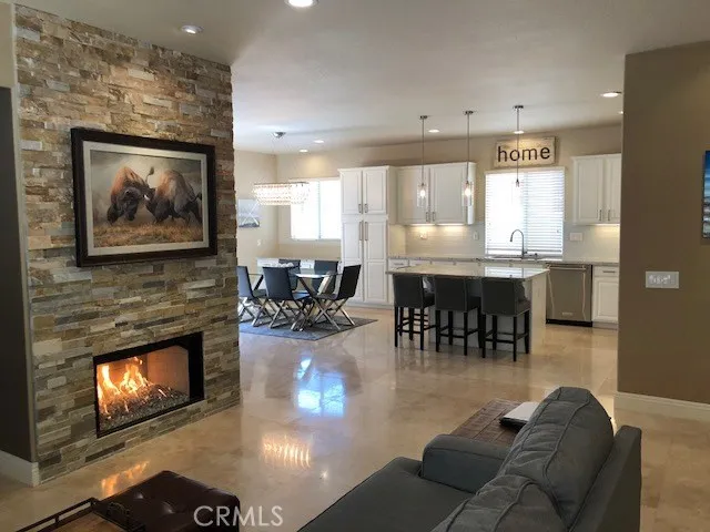 While relaxing on the couch in front of the fire or watching TV, this is your view to the kitchen.