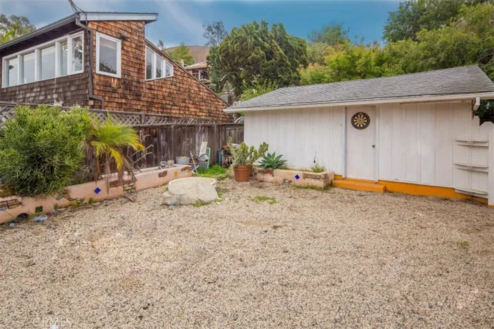 Side Yard and view of the 2 car garage. Next door is 1044 Van Dyke that is also for sale by same owner. Properties can be purchased together or separately.