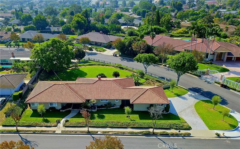 Ranch style singe-story on spacious corner lot.