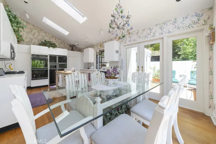 Double french doors on two sides of this southeastern facing dining area