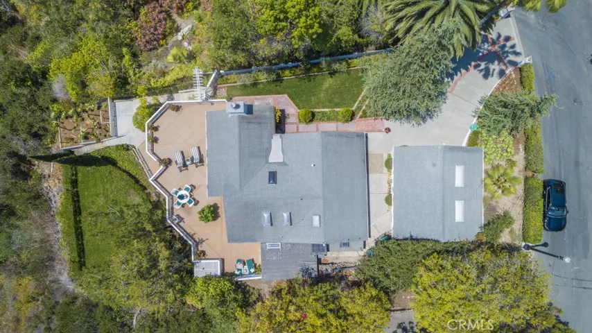 The home currently occupies only the front part of the 18,330 square foot lot.
