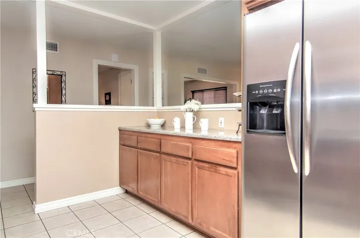 Check out this perfect space to set out the Holiday Buffet! And more storage, WOW! Also note the custom baseboards and trim!