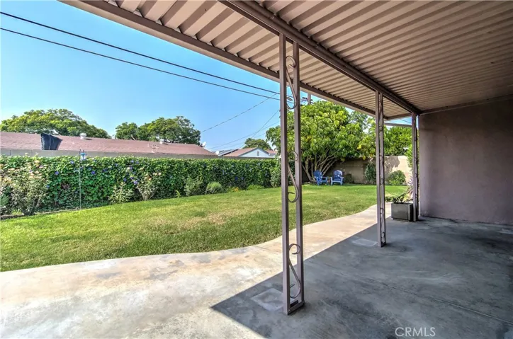 The covered patio is just waiting for that new Alfresco Dining Set the new owner will want to add!