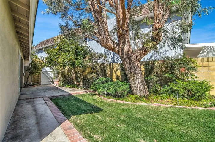 This extra wide side yard creates a nice area for the terrace outside the dining room