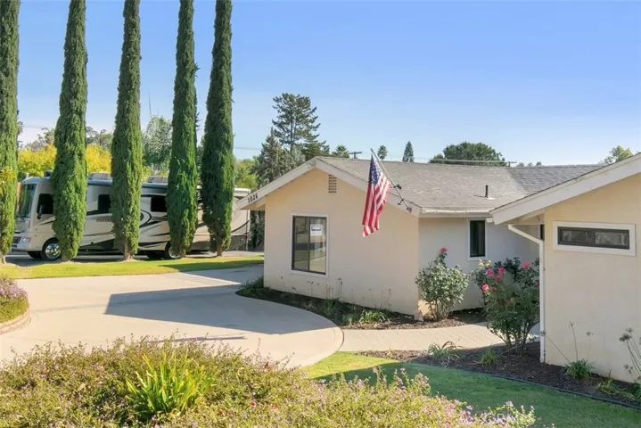 Two Massive RV Parking spots.  Large Circular Driveway and Two-Car Attached Garage