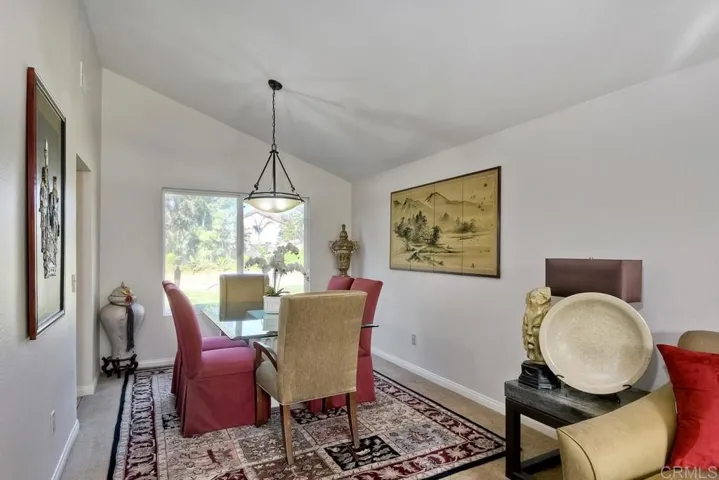Vaulted ceiling in Dining Room!  Plantation Shutters are on order for this room!!