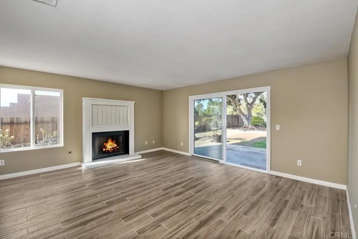 Newer windows throughout!  These sliders open from the FR to the outdoors
