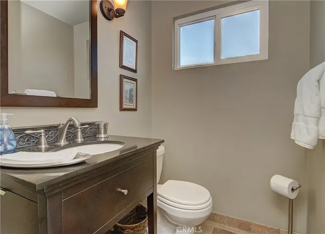 Downstairs powder room has beautiful details.