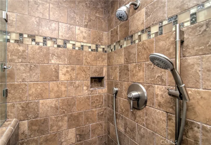 Check out all of the details and conveniences in this gorgeous shower!