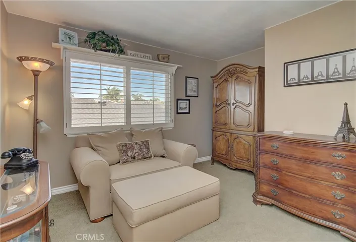 Fourth upstairs bedroom being used as cozy den.