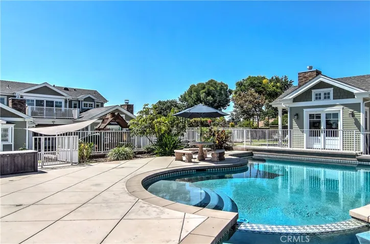 Custom estate with amazing ammenities: Pool and Spa, Guest House, Multiple Yards, Motor Court and Playground.