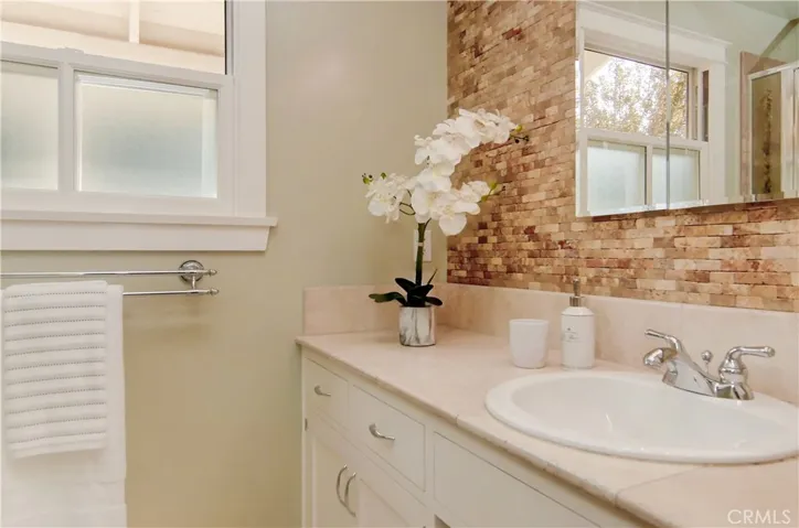 Apartment bath has more nice designer details.