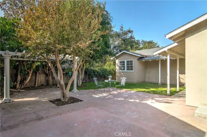 Private rear yard has plenty of room for family and entertaining...or a pool.