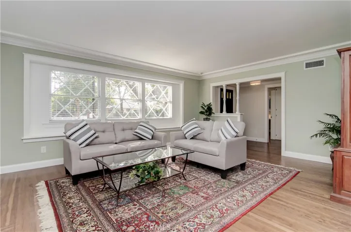 So many lovely details...original windows and hardwood floors have been completely restored and add a wonderful nod to the history of this great home.