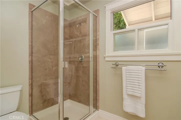 Lovely tile details in this apartment shower...bathroom is roomy!