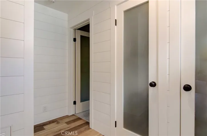 So many gorgeous details...including etched glass interior doors, custom moldings, ship lap walls and Napa French Oak style flooring.