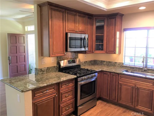 Remodeled Kitchen with Granite Counter Tops