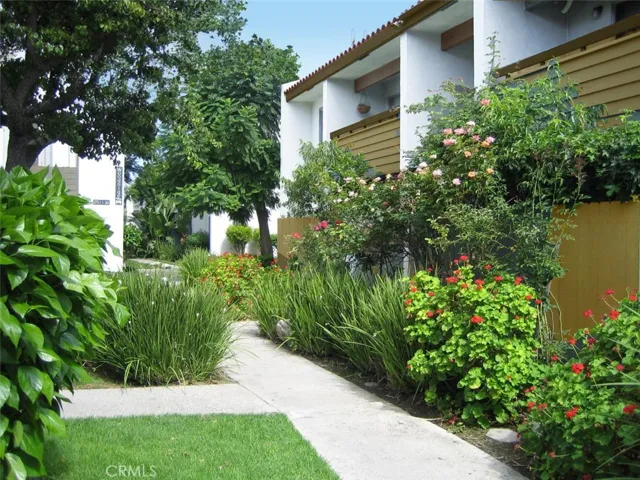 Pathways throughout common areas have lush vegetation.