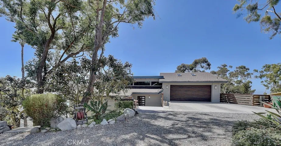 Stunning, panoramic ocean view home located in Laguna Beach's Top of the World featuring 4 bedrooms and 4.5 baths.