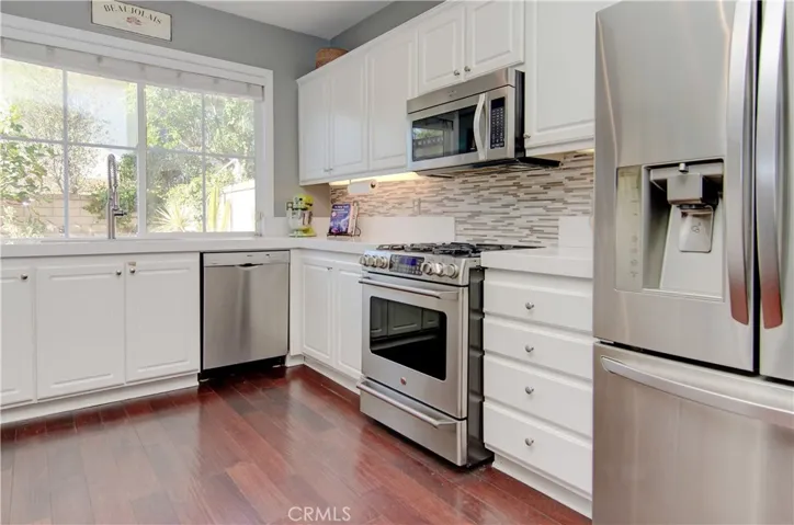 Any cook will love this kitchen...loads of cabinet and prep space plus a sink with a view!