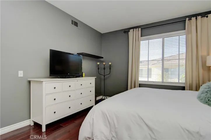 Rich hardwood flooring continues through upstairs master suite and all bedrooms.