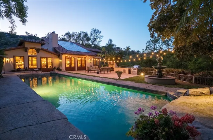 Spectacular pool area and sprawling grounds.